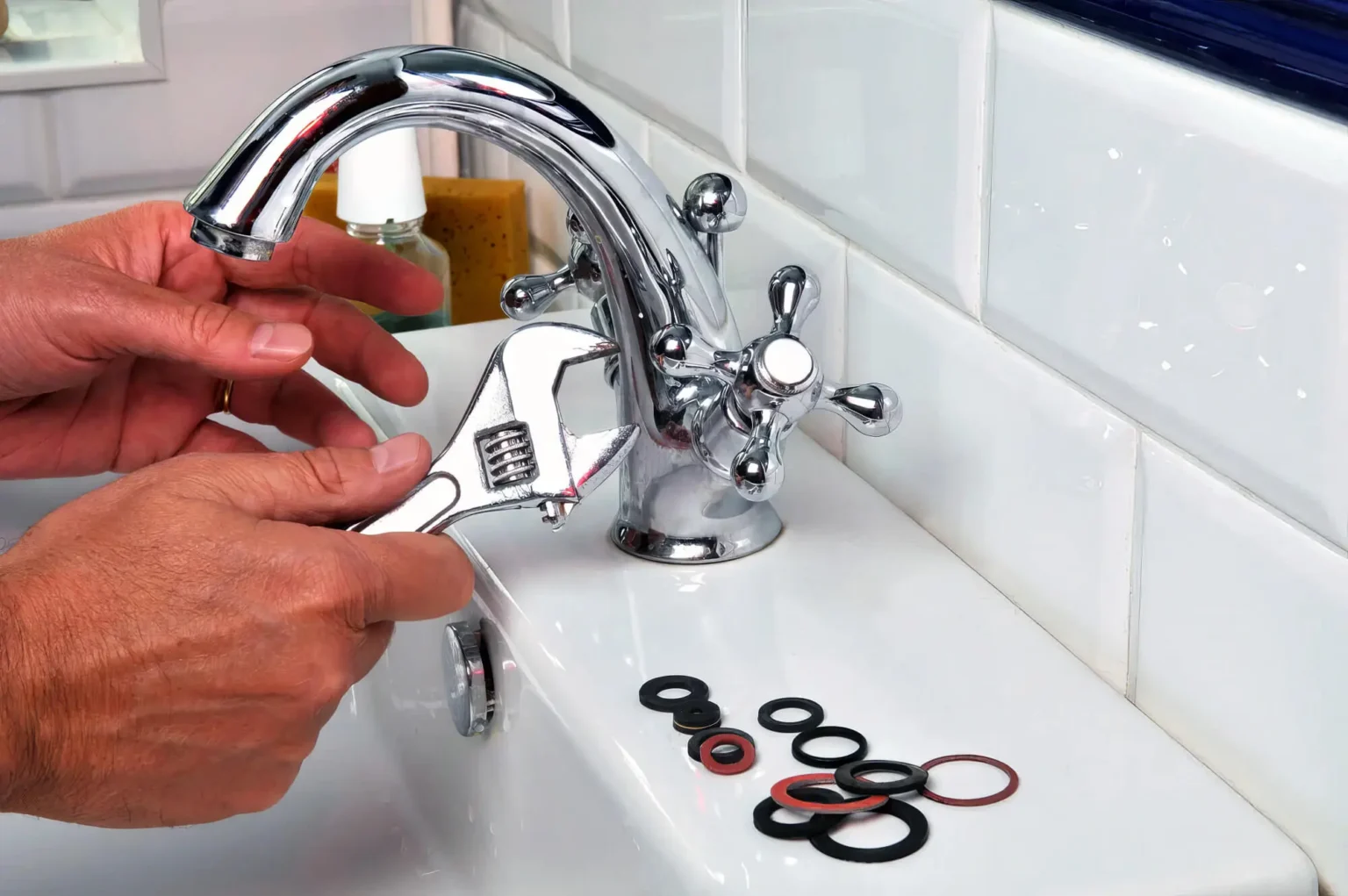 Plumber maintaining a bathroom faucet in San Rafael